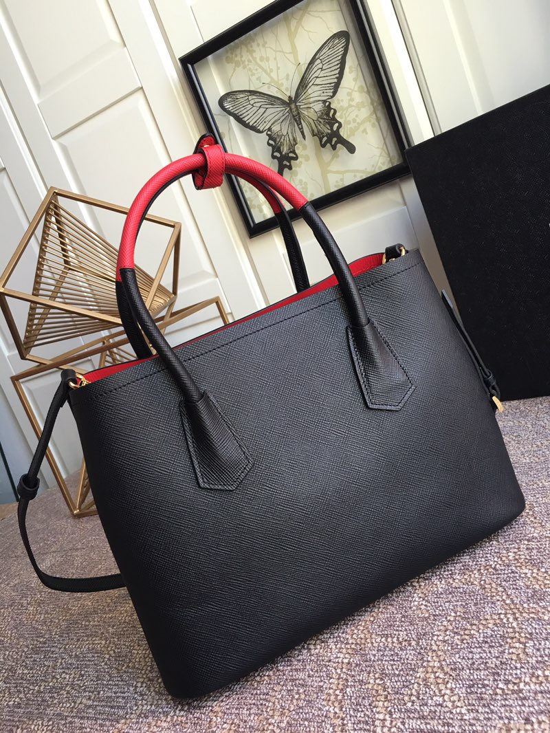 Pra*a top handle bags